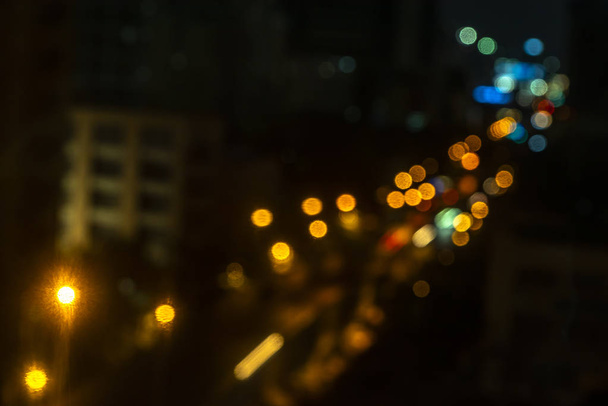 утримання розмивання боке вечірнього варення на дорозі в місті., нічна сцена., Розмиті зображення не Фокус
 - Фото, зображення