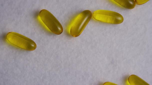 Záběry z rotačního materiálu vitamínů a prášků - Záběry, video