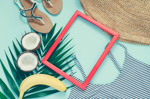 Green palm leaf  and travel objects on  background - Fotó, kép
