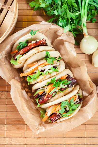 Gua bao, steamed buns with pork belly and vegetable - Foto, imagen