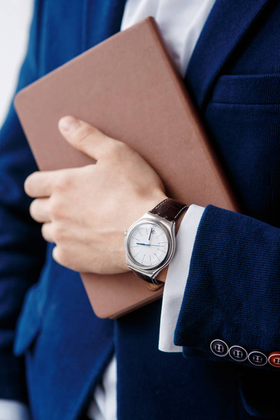 hand of businessman with clock closeup - Фото, изображение