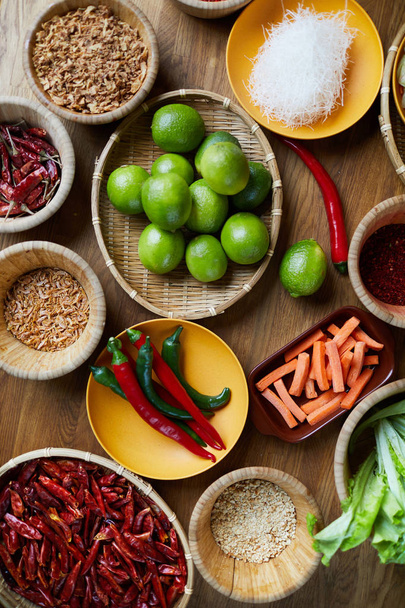Above view background of various spices in wooden bowls on table, copy space - Photo, Image