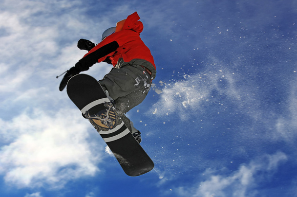 スノーボーダーの高い空気中でジャンプ - 写真・画像