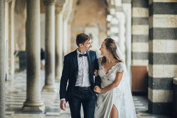 Young wedding couple having fun Time  in Italy.  - Фото, изображение