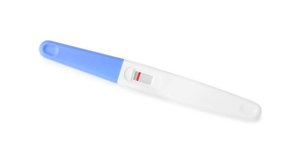 negativer Schwangerschaftstest auf weißem Hintergrund - Foto, Bild