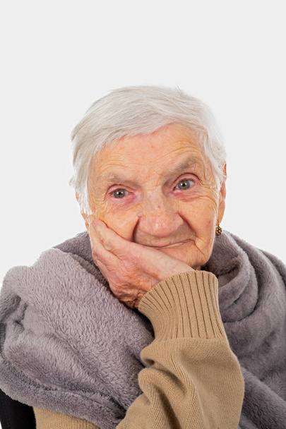 Old depressed lady on isolated - Foto, immagini