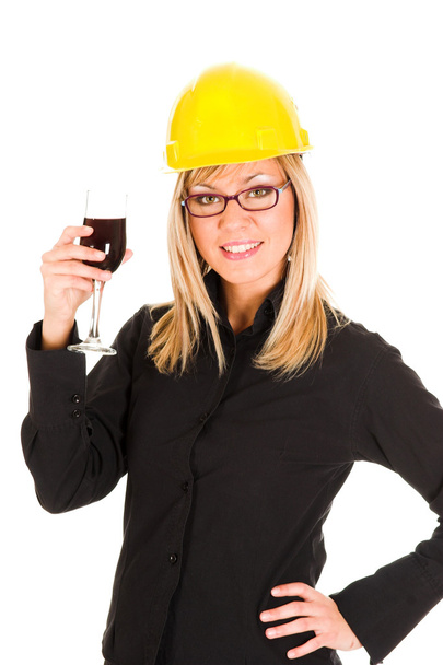 Businesswoman with a glass of wine - Фото, изображение