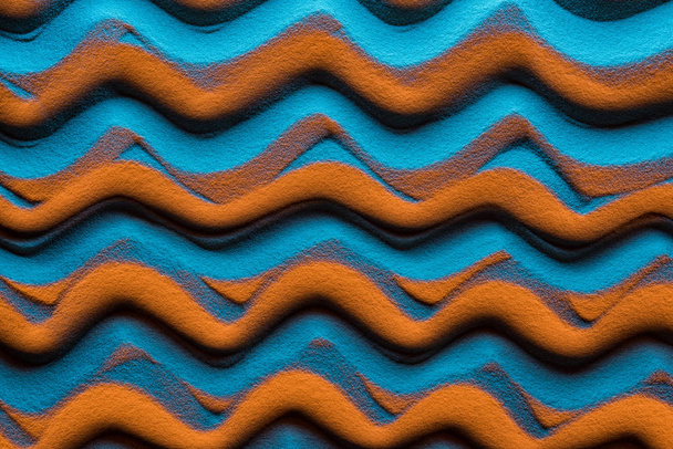 vista superior del fondo ondulado con arena y filtro de color
 - Foto, imagen