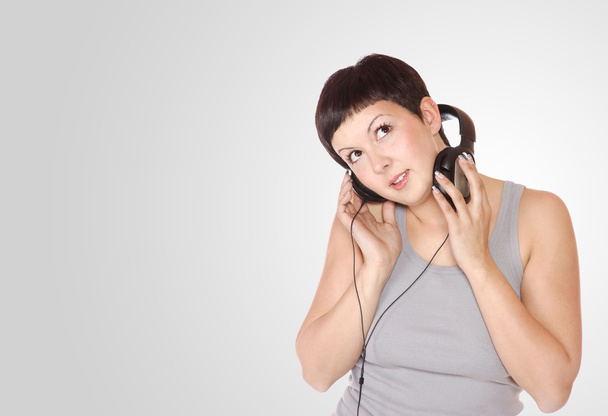 exy young woman with headphones - Foto, imagen