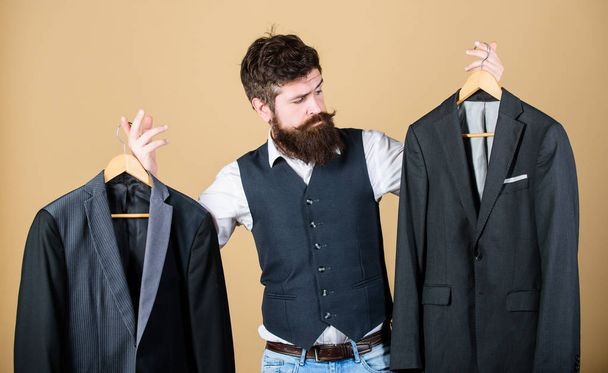 Designing made to measure suit. Custom made suit. Man bearded fashion couturier tailor. Elegant custom outfit. Tailoring and clothes design. Perfect fit. Custom made to measure. Tailored suit concept - 写真・画像