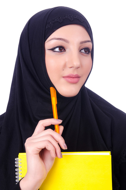 Young muslim woman with book on white - Photo, Image