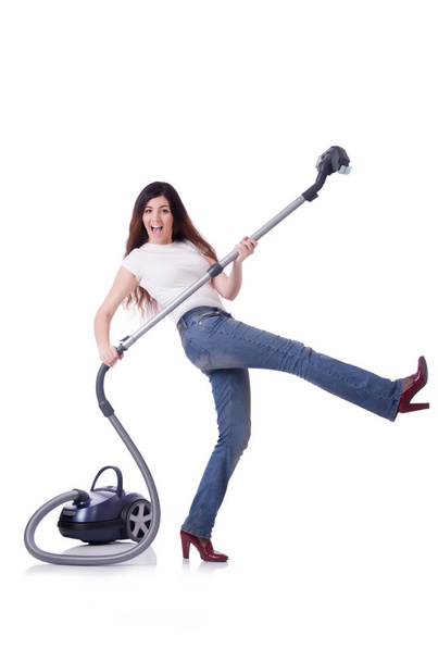 Young woman with vacuum cleaner on white - Fotoğraf, Görsel