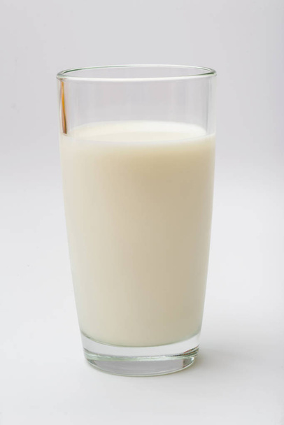 glass of milk on a white background - 写真・画像