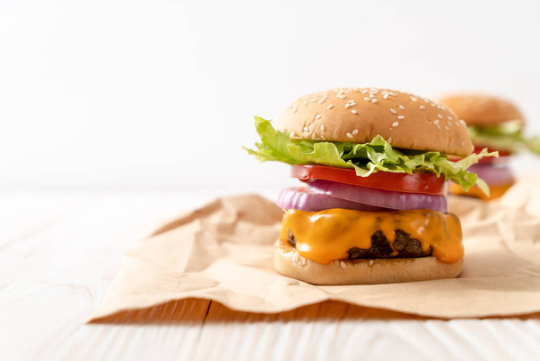 fresh tasty beef burger with cheese and french fries - Photo, Image