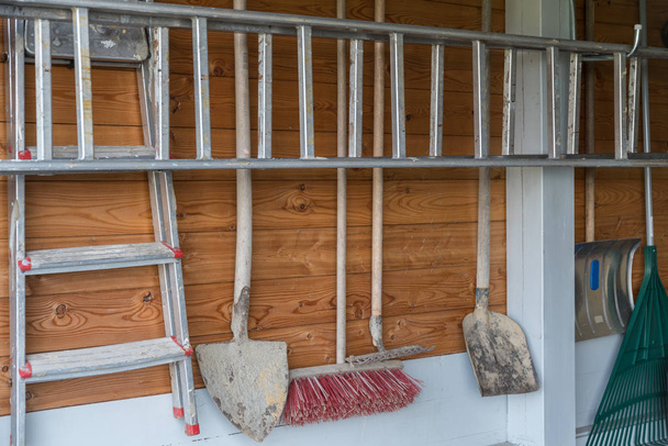 Garden tools arranged in garage - Photo, Image
