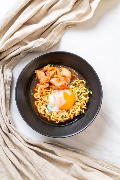 Korean instant noodles with kimchi and egg - Fotoğraf, Görsel