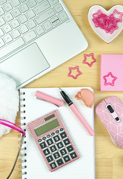 Feminine desk workspace with modern touch-screen laptop with pink accessories - Φωτογραφία, εικόνα