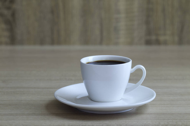 Kaffeetasse auf Holz Hintergrund - Foto, Bild