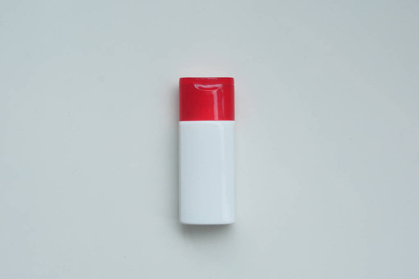 Cosmetic plastic bottle for lotion, cream, shampoo, bath foam is - Fotoğraf, Görsel