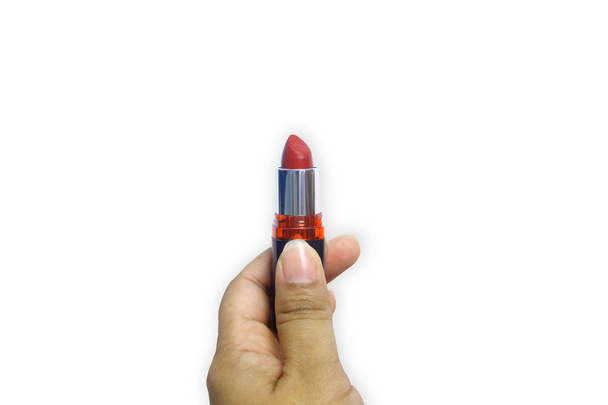 Red lipstick in woman hand isolated on white background, Minimal - Fotografie, Obrázek