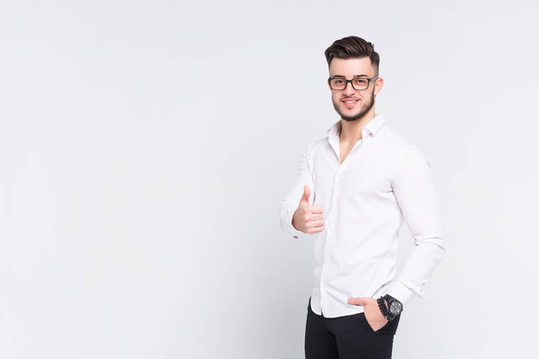 Young businessman having nice day at work isolated on white background - Φωτογραφία, εικόνα