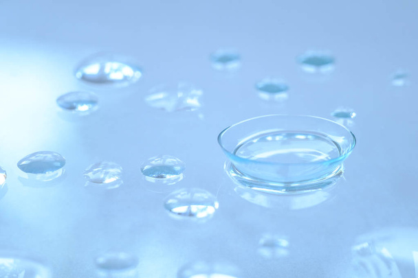 Contact lenses and water droplets, ultra-wetting and comfortable wearing of contact lenses - Photo, Image