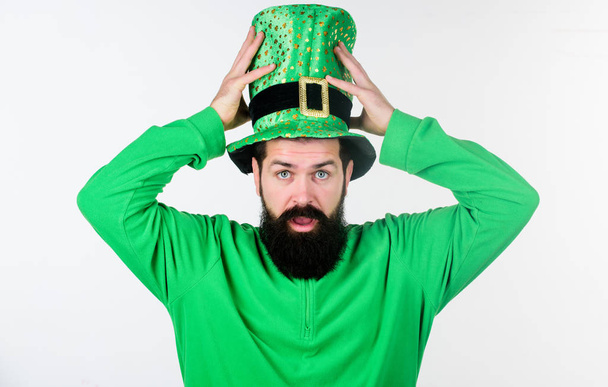 Myth of leprechaun. Happy patricks day. Global celebration of irish culture. Man bearded hipster wear green clothing and hat patricks day. Saint patricks day holiday. Green color part of celebration - Zdjęcie, obraz