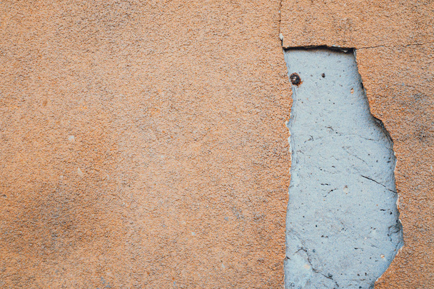 Red orange wall with cracks, texture background. - Photo, Image