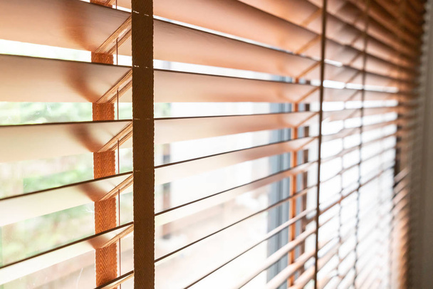 Wooden shutters on the window in the living room - Foto, Bild