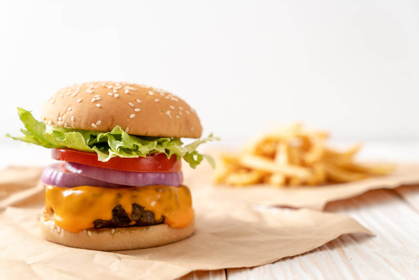 fresh tasty beef burger with cheese and french fries - Photo, Image