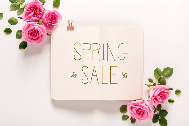 Spring sale message with roses and leaves - Photo, image