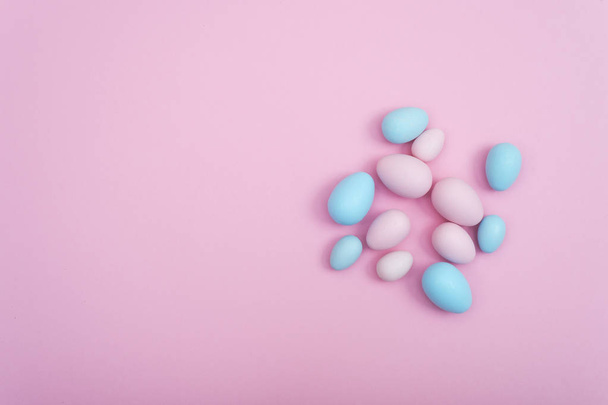 Spreaded Easter eggs on pink background - Photo, Image