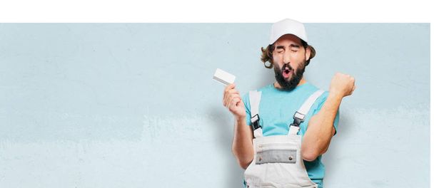 professional painter with a credit card - Foto, Imagem