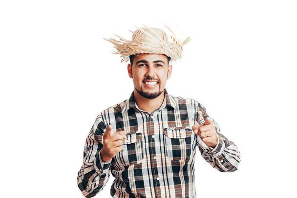 Brazilian man wearing traditional clothes for Festa Junina - June festival - isolated on white background - Foto, afbeelding