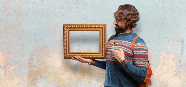 young hippie man with a baroque frame - Fotografie, Obrázek