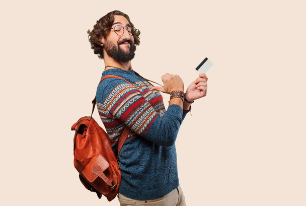 young hippie man with a credit card - Фото, зображення