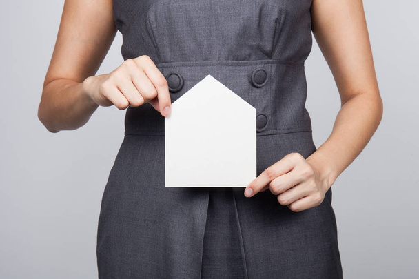 picture of woman holding paper house - Foto, immagini
