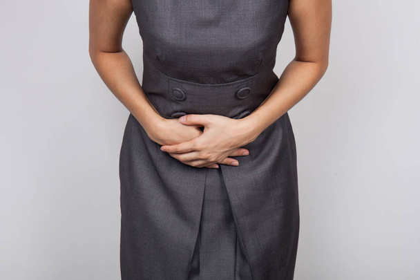 Woman with hemorrhoids, pain in the stomach  - Valokuva, kuva