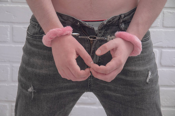 Sexy guy in handcuffs. - Photo, Image