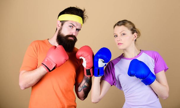 One spirit, one team, one win. punching, sport Success. sportswear. Fight. training with coach. Happy woman and bearded man workout in gym. knockout and energy. couple training in boxing gloves - Fotografie, Obrázek
