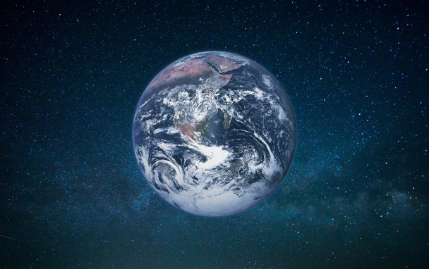 Планета Земля у відкритому космосі на фоні галактики
 - Фото, зображення