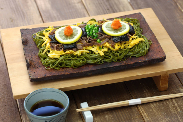 kawara soba, japanese local food,  fried green tea buckwheat noodles on roof tile - Photo, Image
