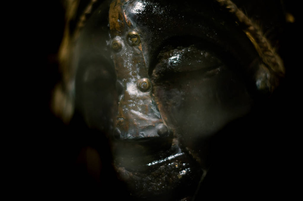 African wooden mask. Black background. Fear. - Fotografie, Obrázek