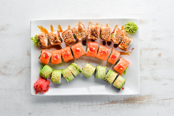 Set Sushi Roll. Chinese traditional dish. Top view. Free copy space. - Zdjęcie, obraz