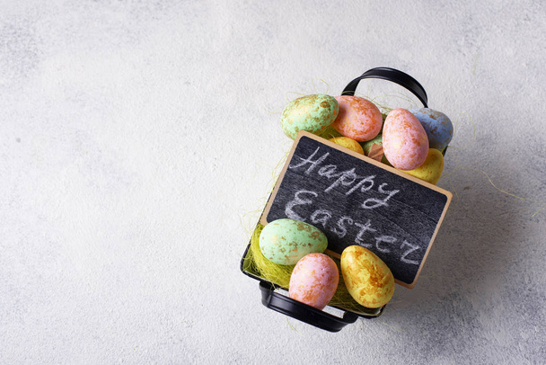 Easter background with decorative eggs - Foto, imagen