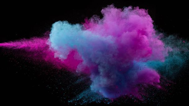 Collision of two colored powders isolated on black - Photo, Image