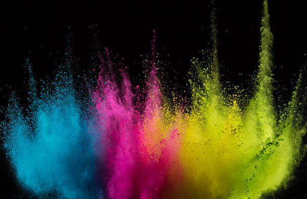 Explosion of colored powder isolated on black - Photo, image