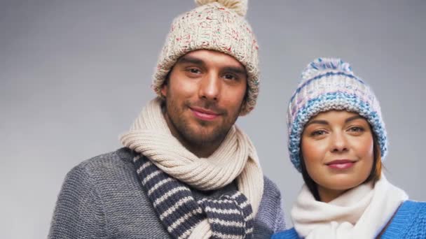 happy couple in winter clothes - Imágenes, Vídeo
