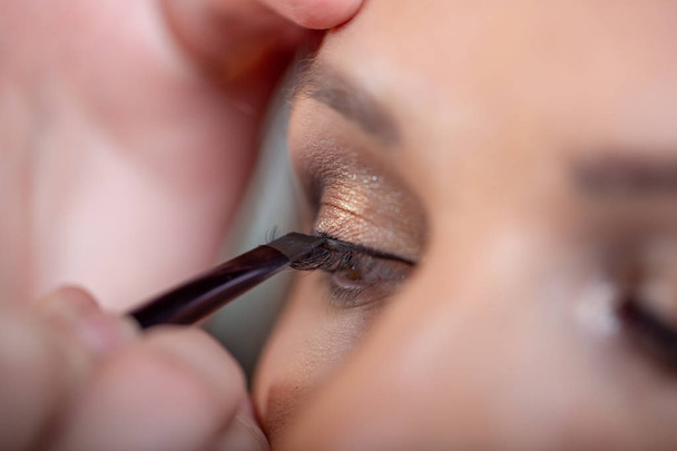Make-up met zwarte eyeliner close-up. Perfecte make-up - Foto, afbeelding