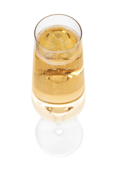 Glass of champagne on white background. Festive drink - Photo, image